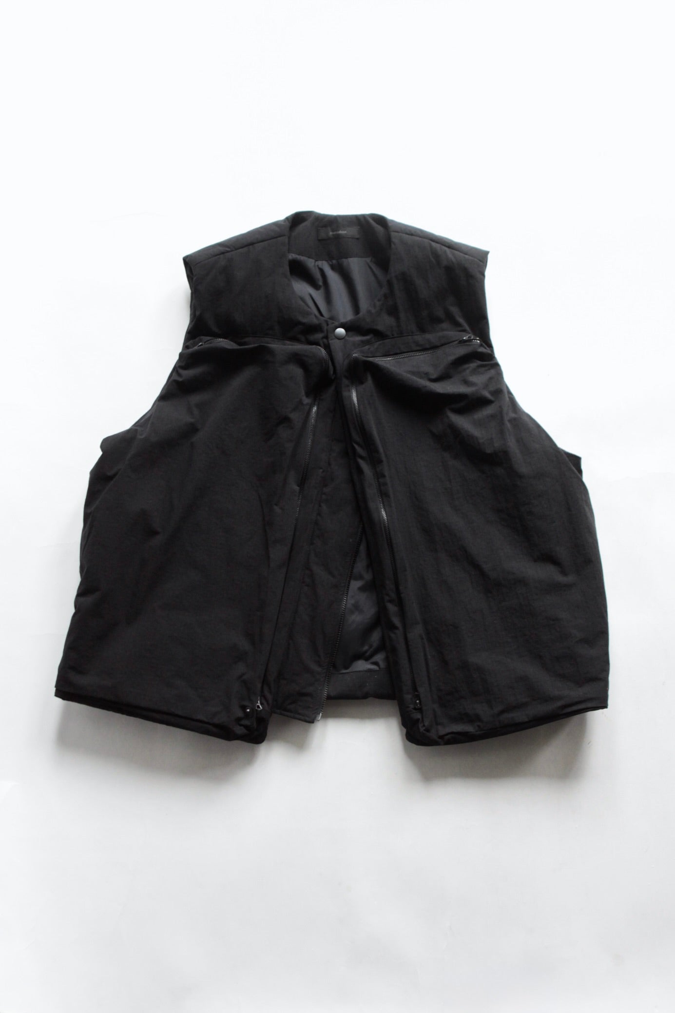 roundabout / Big Pocket Padded Vest – UN