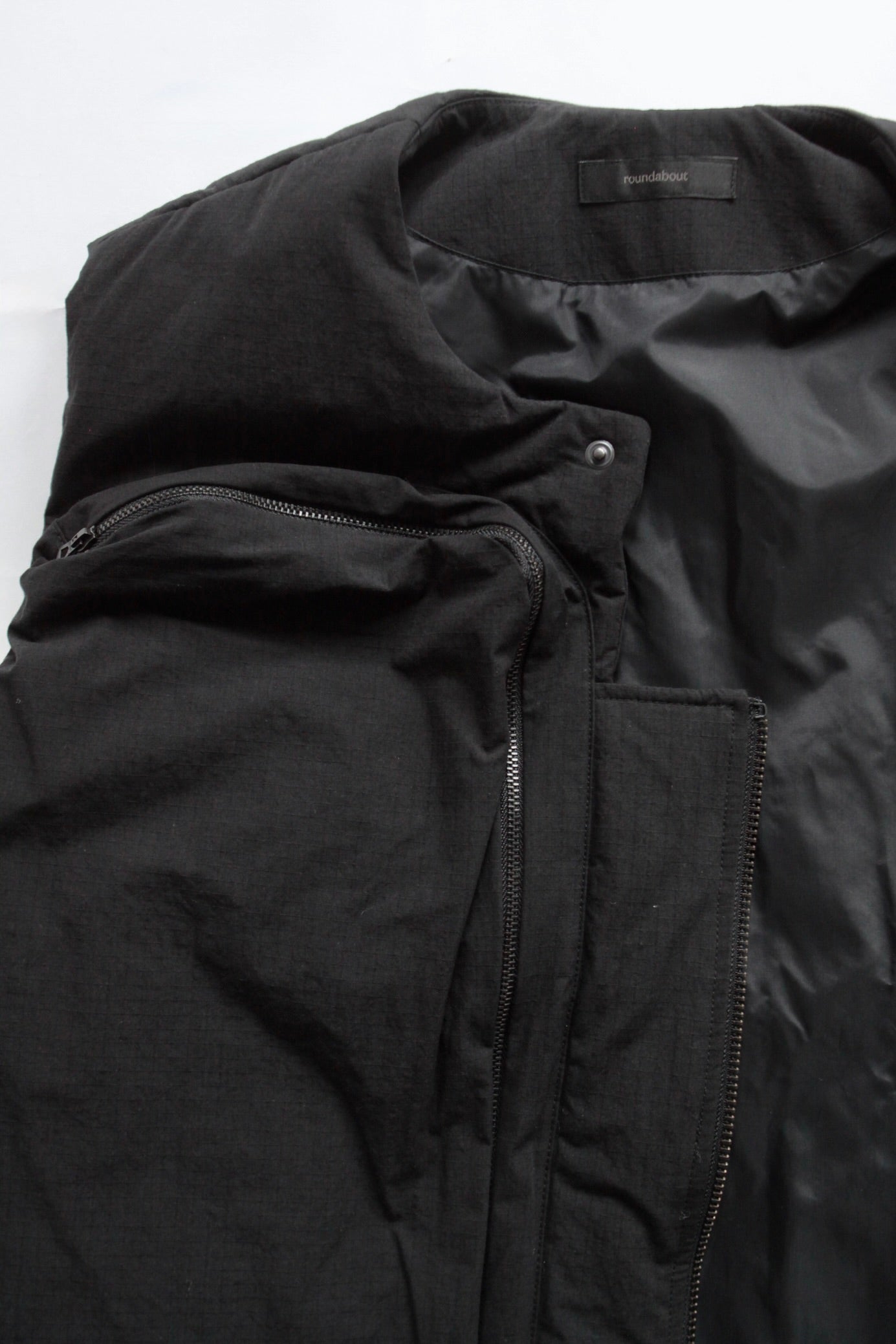roundabout / Big Pocket Padded Vest – UN